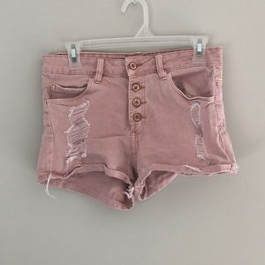 Ripped pink shorts